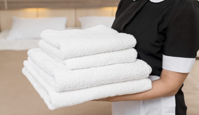 chambermaid-preparing-hotel-room chambermaid-preparing-hotel-room