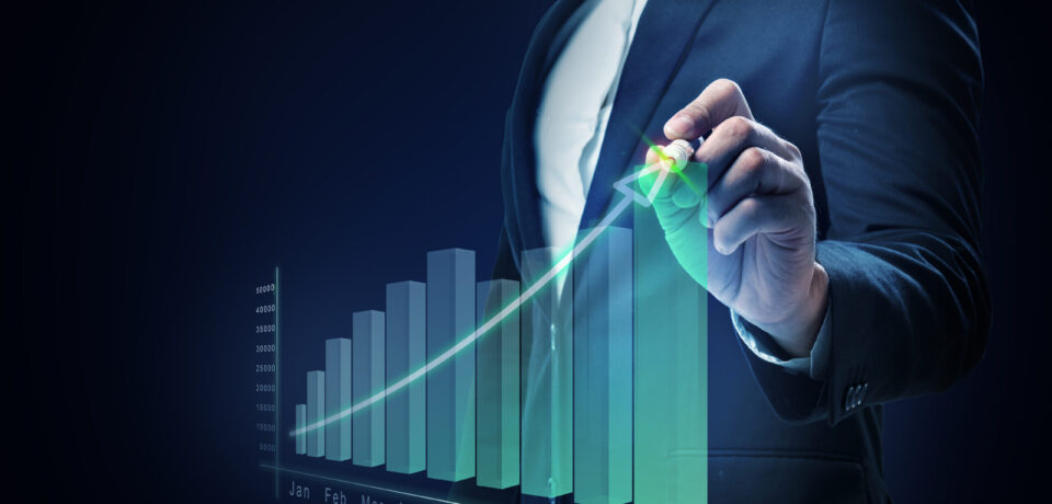 Businessman drawing a increases graph on virtual screen. Business concept