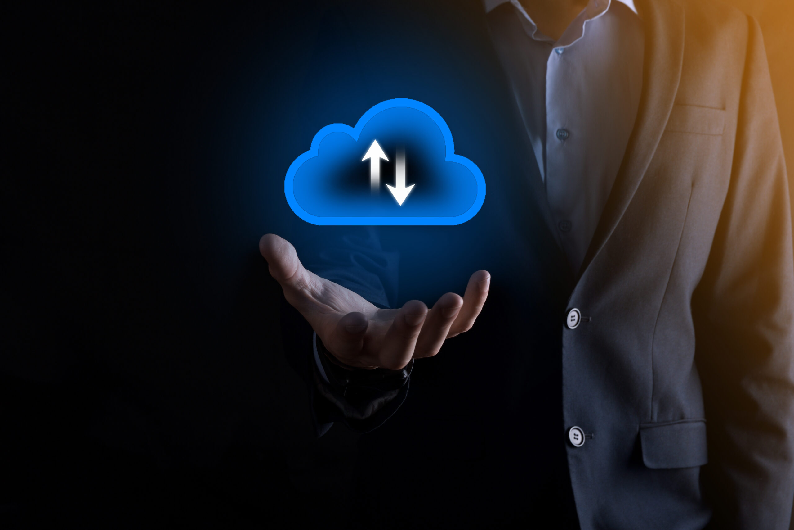 Businessman hold cloud icon.Cloud computing concept – connect smart phone to cloud. computing network information technologist with smart phone.Big data Concept. Cloud Migration